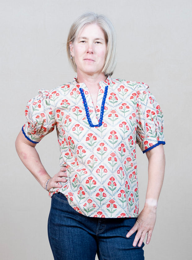 cotton pullover top with sleeve detail and lace trim