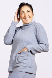 sky blue top with mock neck and pocket
