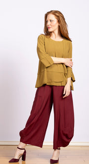 pullover top with front seaming and  button sleeve details in tobacco